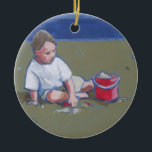 Ornement En Céramique Petit garçon avec Sandcastle et Beach Bucket<br><div class="desc">Un garçon de sable sur la plage Jouer avec le seau Ce petit garçon de plage doux joue sur la plage avec son seau rouge vif. Avez-vous joué dans le sable enfant ? C'est un beau tableau d'un petit garçon jouant dans le sable ; c'est un bébé classique construit dans...</div>