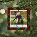 Ornement En Céramique Photo Plaid classique double face personnalisée<br><div class="desc">Un joli ornement photo à double face avec une photo préférée de chaque côté,  sur un arrière - plan festif rouge et vert plaid. Personnalisez avec une légende personnalisée sur le devant en lettres manuscrites,  et ajoutez l'année à l'arrière.</div>