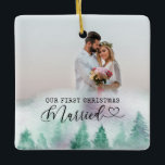 Ornement En Céramique Première Noël Mariée Forêt d'hiver 2 Photo<br><div class="desc">Créez votre propre ornement photo recto verso avec bordure de forêt d'hiver aquarelle. Le texte dit "notre premier mariage de noël" dans un texte de machine à écrire et une calligraphie élégante avec un coeur d'amour. Le modèle photo est configuré pour ajouter 2 photos - une par côté. Vous pouvez...</div>