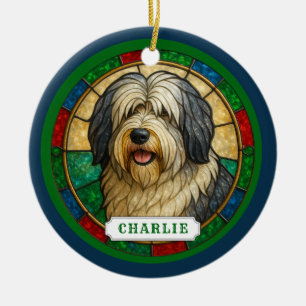 Ornement en céramique rond de chien de berger des