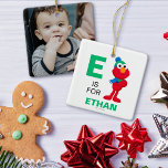 Ornement En Céramique Rue Sésame | Winter Elmo<br><div class="desc">Le Casse-Noix avec Elmo & Tango | Ce graphique amusant présente Elmo posant avec un casquette et un foulard d'hiver.</div>