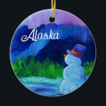 Ornement en céramique Snowman Dreams avec ALASKA<br><div class="desc">Célébration des neigeurs de l'Alaska</div>