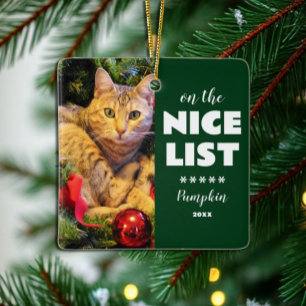 Ornement En Céramique Sur la liste des gentils Chat de Noël Photo de com