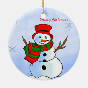 Ornement En Céramique Un bonhomme de neige sur la neige et les flocons d