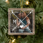 Ornement En Céramique Your Rustic Elegant Monogrammed Love Heart Arrows<br><div class="desc">Unique,  classic,  trendy,  rustic and decorative Christmas holiday tree ornament,  with Happy Holidays and a Joyful New year text quote,  and room to customize or personalize with a photo and names (or family name) of your choice on a rustic country cottage style weathered farmhouse barn wood planks texture pattern.</div>