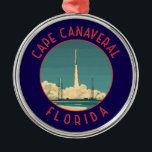 Ornement En Métal Cape Canaveral Floride Retro Cercle désorganisé<br><div class="desc">Cape Canaveral design de déplacement vectoriel rétro. Cape Canaveral est une ville sur la côte atlantique de Floride. Le Kennedy Space Center,  au nord de la ville,  présente une simulation de lancement de navette de la NASA et des souvenirs d'astronautes.</div>