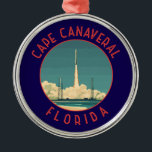Ornement En Métal Cape Canaveral Floride Retro Cercle désorganisé<br><div class="desc">Cape Canaveral design de déplacement vectoriel rétro. Cape Canaveral est une ville sur la côte atlantique de Floride. Le Kennedy Space Center,  au nord de la ville,  présente une simulation de lancement de navette de la NASA et des souvenirs d'astronautes.</div>