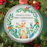 Ornement En Métal Jungle Giraffe Baby's First Christmas Ornament<br><div class="desc">Cute baby's first Christmas ornament the sweetest little giraffe framed with watercolor jungle leaves.</div>