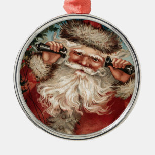 Ornement En Métal Père Noël vintage sur le téléphone