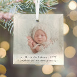 Ornement En Verre 1 Photo Baby's 1st Christmas Modern Minimal Carré<br><div class="desc">Célébrez les joies simples de votre tout nouveau membre de la famille avec un élégant ornement photo carré personnalisé. Le design neutre est adapté pour un nouveau bébé garçon ou une nouvelle fille. L'écriture et l'image de ce modèle sont simples à personnaliser. (CONSEIL DE CONCEPTION D'IMAGE : Pour centrer la...</div>