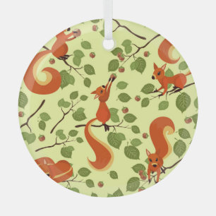 Ornement En Verre Écureuil rouge dans des branches noisettes.
