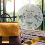 Ornement En Verre Novembre Chrysanthemum Peony Anniversaire Keepsaké<br><div class="desc">Novembre a en fait deux fleurs et deux pierres gemmes pour célébrer les anniversaires pour ce mois : les fleurs — chrysanthème et pivoine ; pierres gemmes — topaz et citrine. Ce design est complet. Ce design présente des détails en blanc, noir, et les couleurs en pierres précieuses. Nous l'avons...</div>