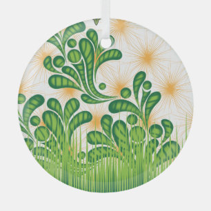 Ornement En Verre Un motif artistique vert et or représentant un arb