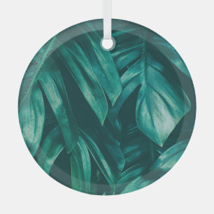 Ornement En Verre Vert foncé, feuillage de jungle tropicale.