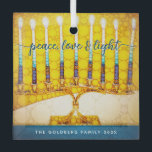 Ornement En Verre Yellow Hanoukka Menorah Peace Love Script<br><div class="desc">"Paix, amour et lumière." Un gros plan photo numérique illustration d'une menorah d'art brillante, colorée, jaune et or, avec votre nom personnalisé, vous aide à inaugurer les vacances d'Hanoukka dans le style. Sentez la chaleur et la joie de la saison des Fêtes chaque fois que vous raccrochez ce magnifique ornement...</div>
