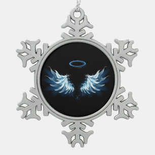 Ornement Flocon De Neige Ailes d'ange bleues lumineuses sur fond noir