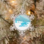 Ornement Flocon De Neige Loup solitaire dans WInter<br><div class="desc">Un loup (Canis lupus) traverse un paysage enneigé de bouleaux et de montagnes sur cette image stylisée et monotone bleue.</div>
