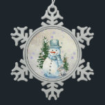 Ornement Flocon De Neige "Snowman en chute de neige" avec lapin et arbres<br><div class="desc">"Snowman in Falling Snow" avec lapin et arbres Snowflake Ornament de Noël de l'adoucissement. Célébrez l'esprit de vacances avec ce charmant bonhomme de neige en ornement de neige tombante, parfait pour ajouter une touche de fantaisie à votre sapin de Noël. Fabriqué à partir d'étain durable, ce charmant morceau comprend un...</div>
