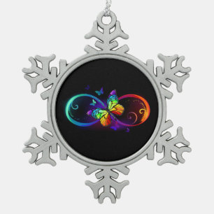 Ornement Flocon De Neige Vibrant infini avec papillon arc-en-ciel sur fond
