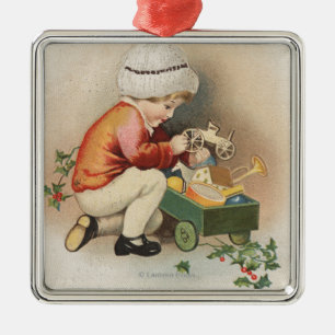 Ornement Métallique Mon Noël WishKid observant des jouets
