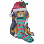 Ornement Photo Sculpture chiot noir et brun mignon avec stockage de noël<br><div class="desc">Ce mignon petit chiot de Noël de race mixte attend avec impatience une visite du Père Noël pour remplir sa réserve de Noël avec beaucoup de cadeaux et d'autres goodies de chien. Cette jolie photo de chiot va égayer toute cuisine festive. L'illustration originale du chiot est peinte en aquarelle et...</div>