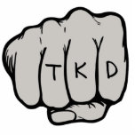 Ornement Photo Sculpture TKD Premier ornement<br><div class="desc">Les arts martiaux TKD Fist Ornament fait une idée cadeau taekwondo unique pour un anniversaire, Noël, vacances ou ceinture test de promotion ou examen de rang. Cet ornement d'arts martiaux présente un design de poing dans un punch moyen (avec l'aimable autorisation de designious.com) avec les lettres posées sur les poignées....</div>