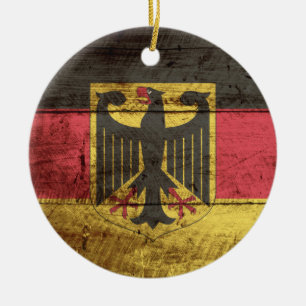 Ornement Rond En Céramique Drapeau de l'Allemagne sur un vieux grain de bois