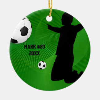 Ornement vert et noir de Noël du football