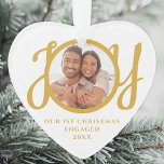 Our First Christmas Engaged Photo Heart-Shaped<br><div class="desc">This keepsake heart-shaped First Christmas Engaged photo ornament is decorated with the word JOY in stylish gold script typography. Easily customizable.</div>
