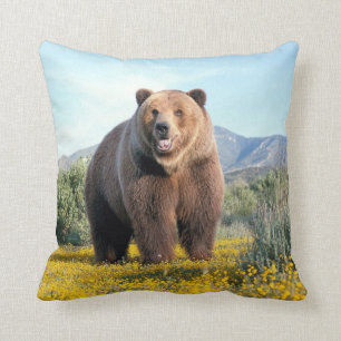 OURS BROWN DANS LE COUSSIN SAUVAGE DE COUSSIN