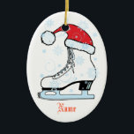 Ovale En Céramique Ornement de patinage sur glace<br><div class="desc">Patinage sur glace personnalisé portant un chapeau santa. Votre nom d'un côté et celui de l'autre.</div>