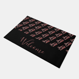 Paillasson Ciseaux en or rose et peigne noir