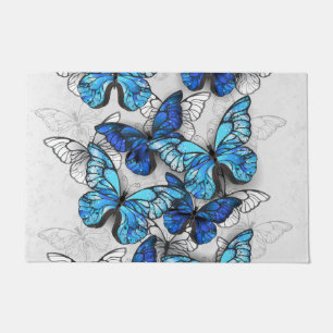Paillasson Composition de papillons blancs et bleus