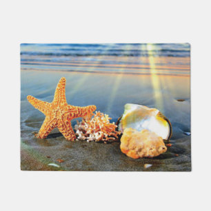 Paillasson Coquillages marins et étoiles de mer sur la plage