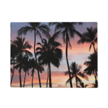 Coucher de soleil des palmiers tropicaux