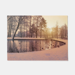 Paillasson Coucher de soleil sur le parc avec petit lac gelé