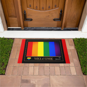 Paillasson Drapeau arc-en-ciel et mâts de la maison de fiert