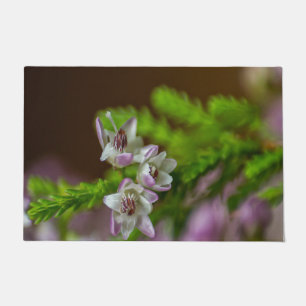 Paillasson Fleur de printemps de Heather à feuillage persista