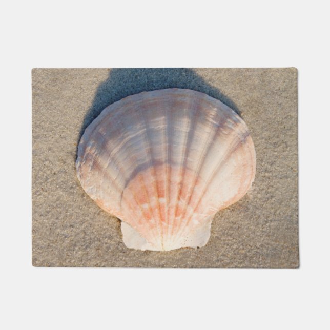 Paillasson Mer Shell s'étendant sur la plage sablonneuse (Devant)