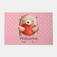 Ours en peluche mignon portant un coeur rouge Bien