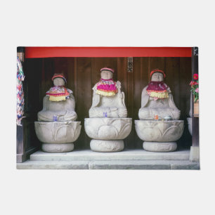 Paillasson Rangée de statues de moines Jizo avec bib et casqu