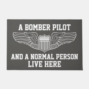 Paillasson Un pilote de bombardier et une personne normale