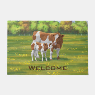 Paillasson Vache de Guernesey et veau mignon dans les pâturag