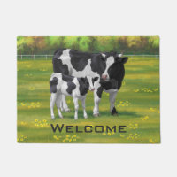 Vache Holstein et veau mignon en pâturage d'été