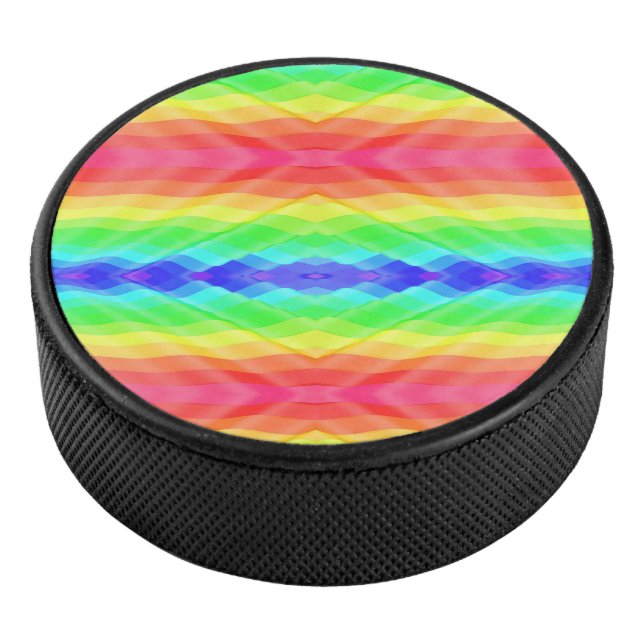 Palet De Hockey A hockey puck with a vibrant, symmetrical rainbow  (3/4/2016 12:00:00 AM)