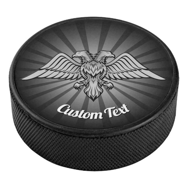 Palet De Hockey Aigle gris avec deux têtes Hockey Puck (3/4/2016 12:00:00 AM)