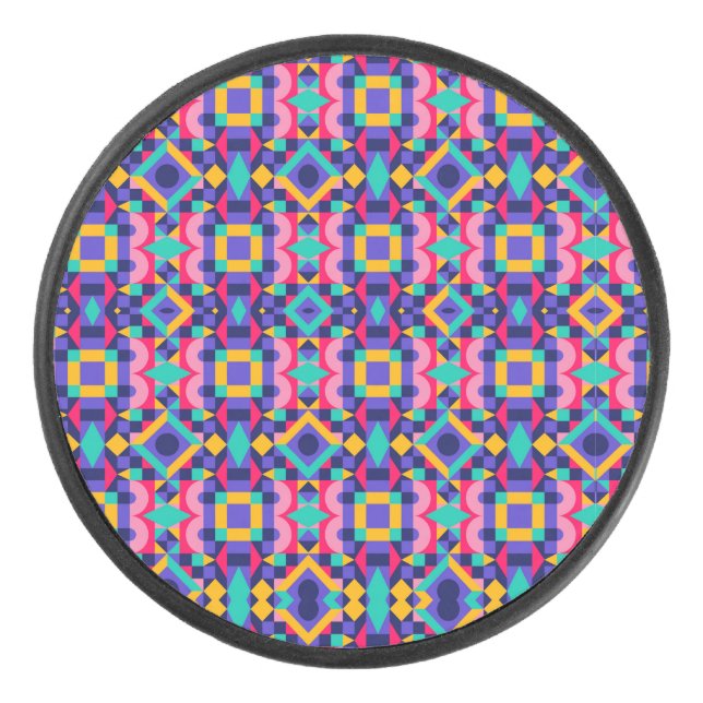 Palet De Hockey Round object with a vibrant geometric pattern (Devant)