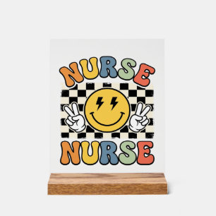 Panneau En Acrylique Conception de chemise à carreaux Smiley d'infirmiè