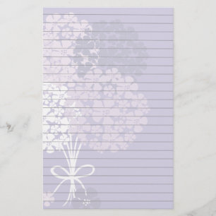 Papeterie Bouquet sur le papier rayé par bleu