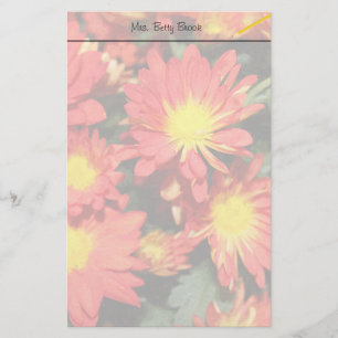 Papeterie Fleurs de marguerite de couleur dorée et orange.
